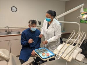 Dentist and Dental Assistant
